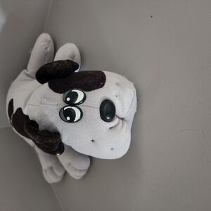 White and Black Plush Dog Toy with Round Body and Large Eyes
